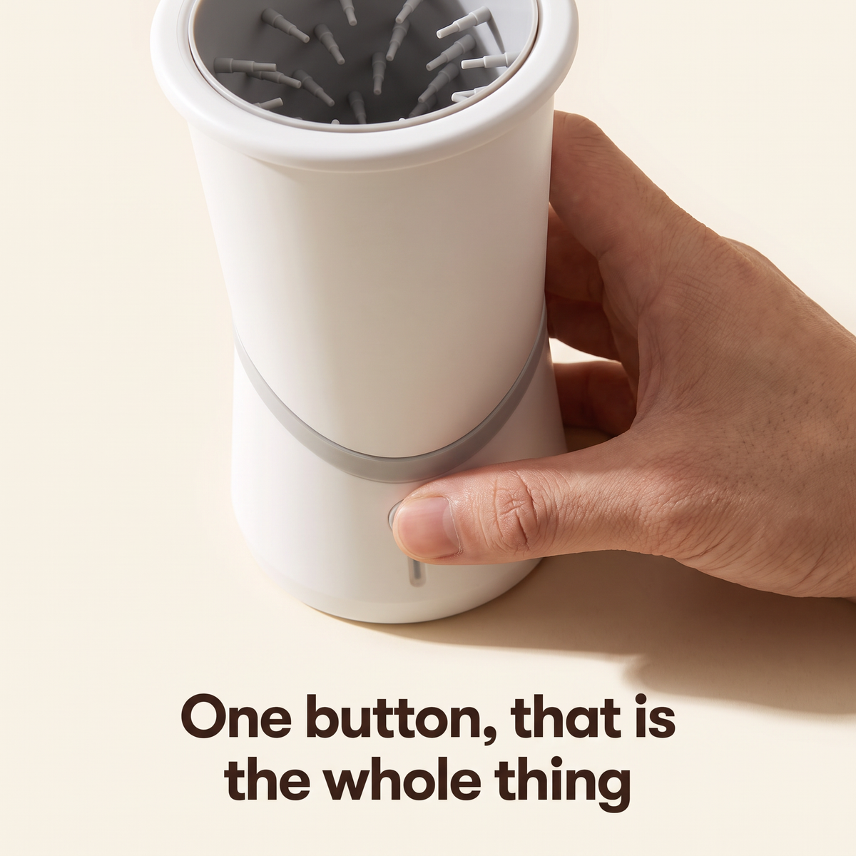 One button, that is the whole thing: a thumb pressing the single power button